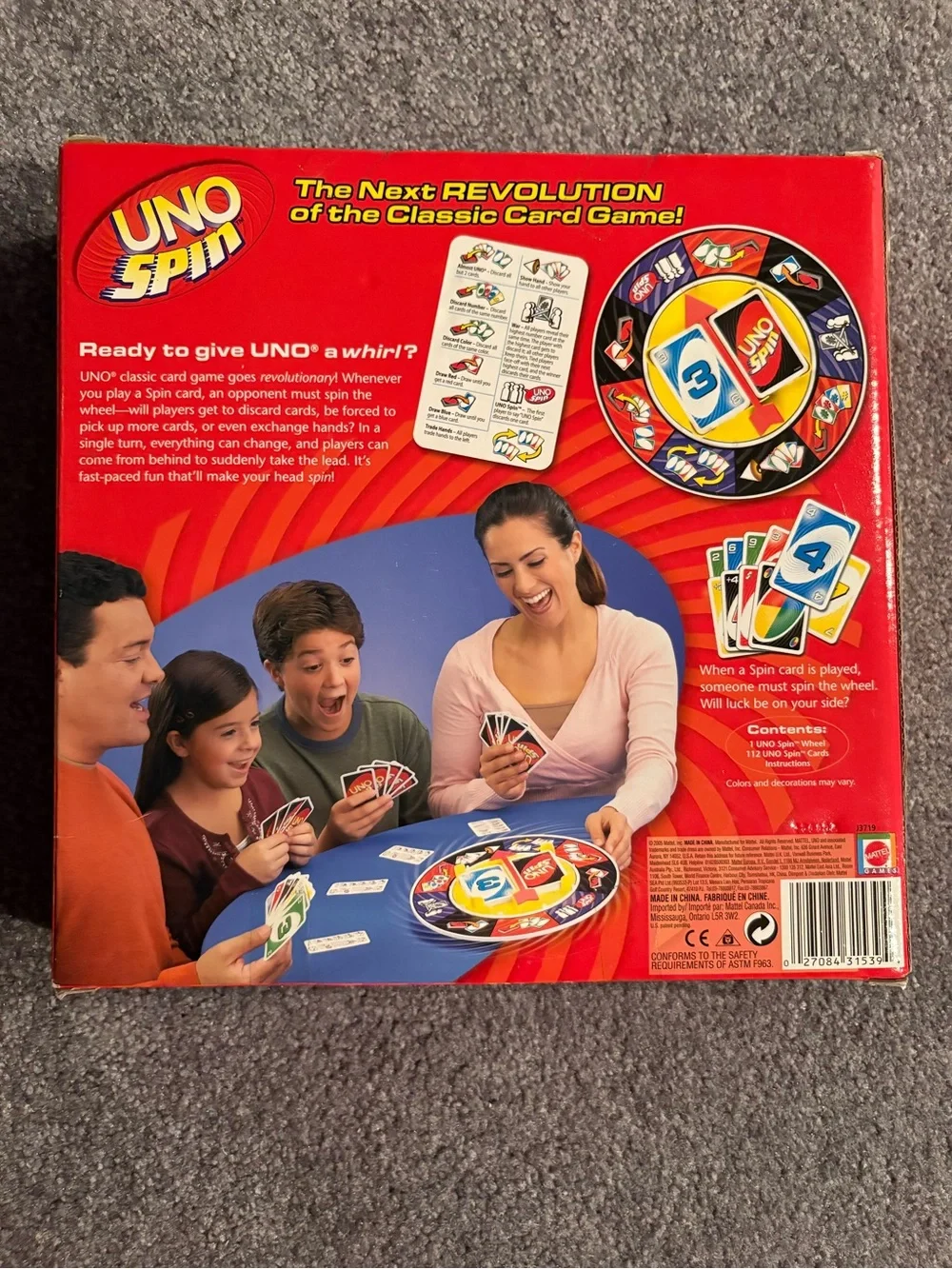 Mattel UNO Spin Card Game - Red, Yellow, Black